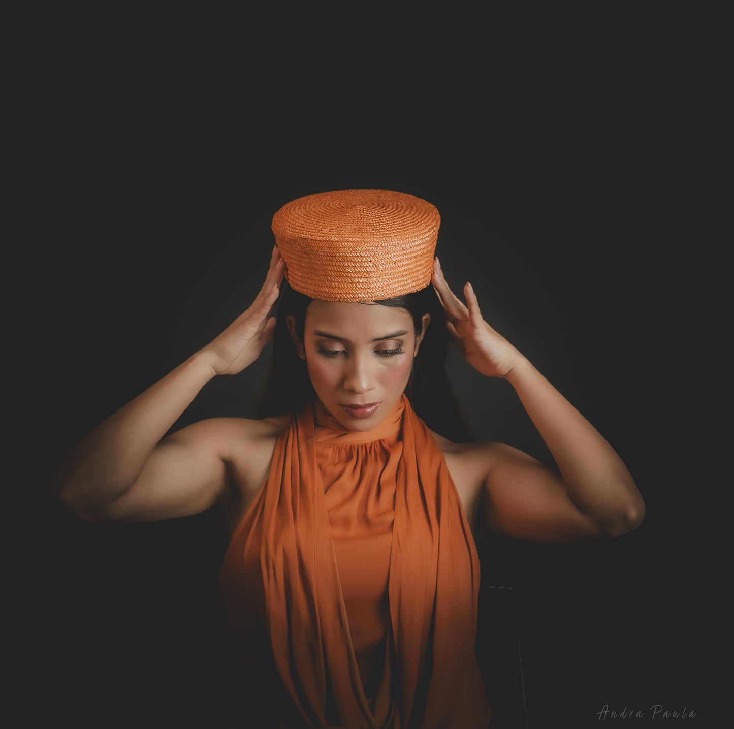 woman wearing a straw beret